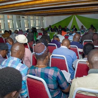 Members reviewing documents at the 2025 AGM